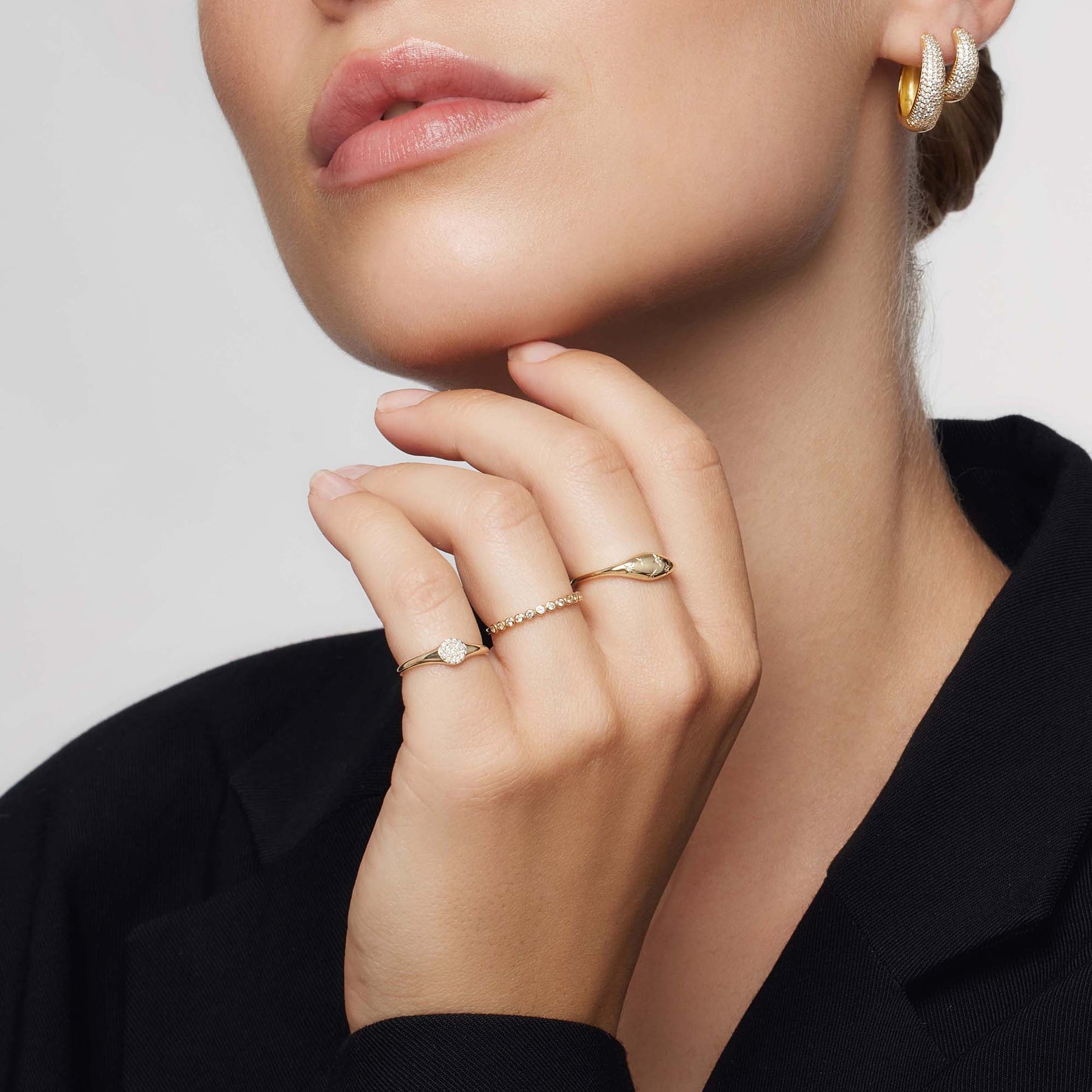 Golden ring in the shape of a diamond